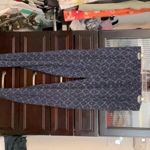 These size SMALL old navy pants are a navy blue with a light blue pattern.